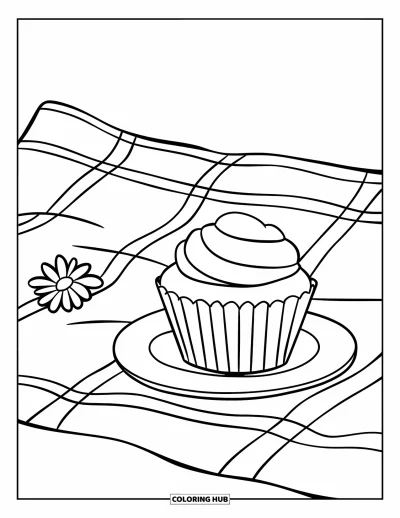 Coloriage de cupcakes pour enfants : Un cupcake avec un tourbillon de glaçage sur une couverture de pique-nique