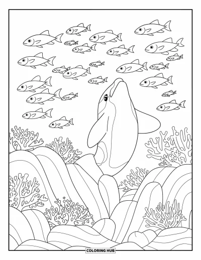 Coloriage d'orque pour enfants : Une orque saute tandis que des poissons nagent entre des collines de corail dans une eau claire