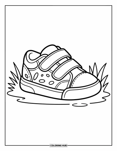 Coloriage de baskets pour enfants : Une basket avec des sangles à pois repose sur l'herbe avec de joyeux petits brins