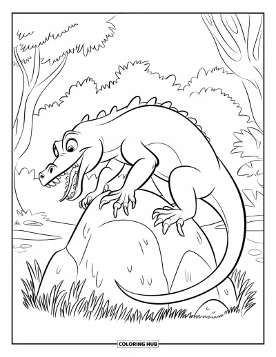 Komodo-Drachen-Ausmalbild für Kinder: Ein Komodo-Drache klettert auf einen Felsbrocken mit trockenem Gras unter seinen Füßen