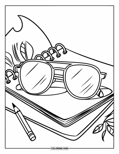 Coloriage de lunettes de soleil pour enfants : Des lunettes de soleil posées sur un carnet avec un crayon et des brindilles feuillues