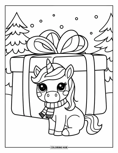 Coloriage de licorne de Noël pour enfants : Une licorne en écharpe rouge est assise près d'un grand cadeau dans la neige