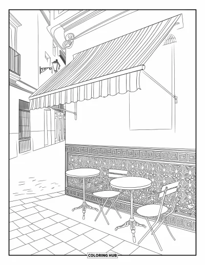 Coloriage d'Espagne pour enfants : Deux petites tables et un auvent rayé ornent un café de rue sur des pavés