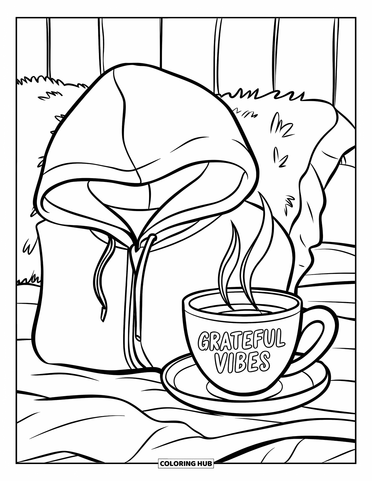 Dankbarkeits-Ausmalbild für Kinder: Ein gefalteter Hoodie und ein dampfender Becher mit “Grateful Vibes” auf einem gemütlichen Bett